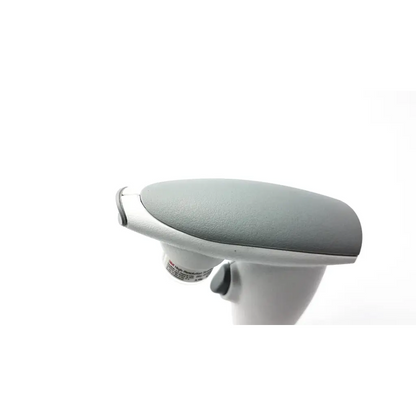 Gray textured grip on a white ergonomic office chair armrest highlighting detail for high-resolution scanning spray use