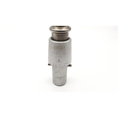 Silver metallic 3m hudson l113 surgical attachment with engraved branding and serial number on industrial connector
