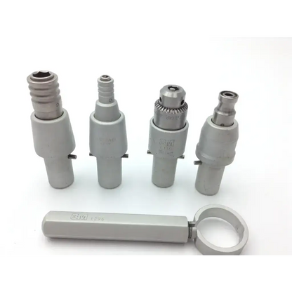 Set of four metallic surgical drill bits with silver large maxi driver and precise engraved markings for l300 large maxi use