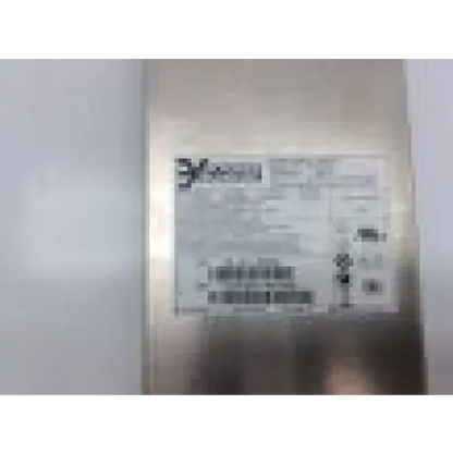 A metallic brushed stainless steel elevator panel with a white label showing black text and barcode for 3m power technology rev 400w power supply