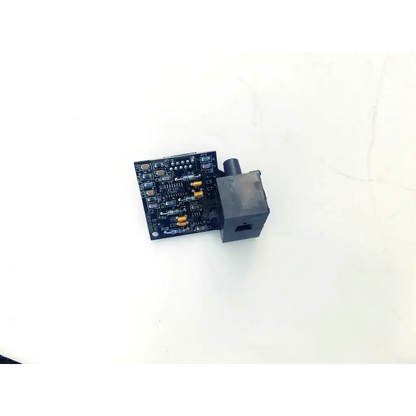 Black rev d circuit board 50033607 with gold-colored components and attached black plastic housing for bbcb3-10a use
