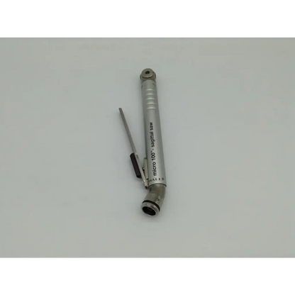 Silver metallic micro 100 sagittal saw with slender blade and textured grip in microaire surgical instruments drill set