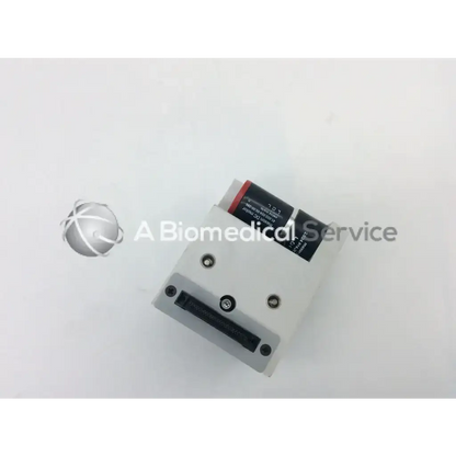 White rectangular hot dot recorder module with black label red accent and three screws by general scannin inc
