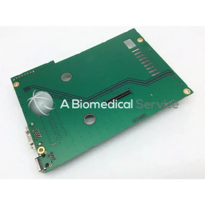 Green rectangular 971-658u4 board with gold mounting screws and silver metallic components for electronics use