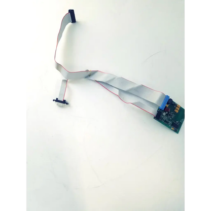 Gray flexible ribbon cable with red edges connecting to green circuit board bbcb3-8c with blue and gold connectors