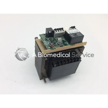 A-dec 43.0043.00 black dental light relay module with green circuit board and black relay for biomedical service use