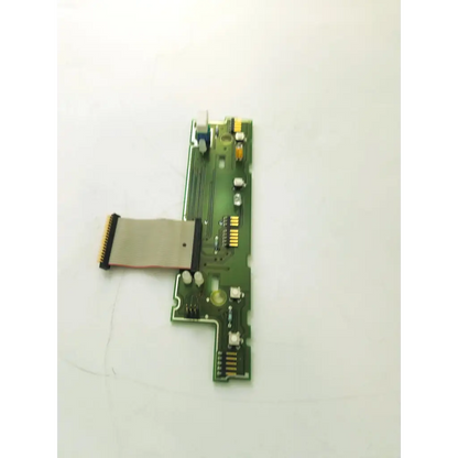 Green circuit board a32000501 02 with flexible ribbon cable featuring board bbcb3-8a 22523sm design