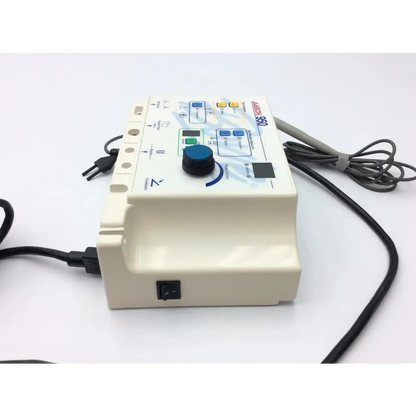 Cream-colored aaron bovie 950 electrosurgical unit generator with blue rotary dial green power light and control buttons