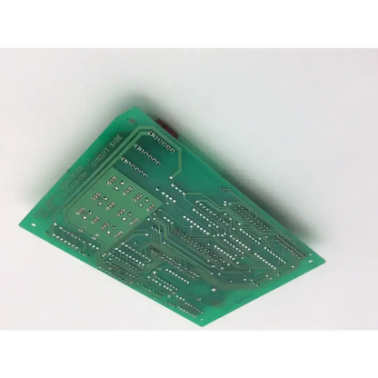 Green rectangular mcu pwa board by abbott laboratories with intricate silver conductive traces for biomedical service and responsible electronics recycling