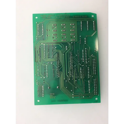 Green rectangular mcu pwa board with silver soldered components and copper traces for biomedical service by abbott laboratories