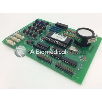 Abbott Laboratories 738-00613-004 green mcu pwa board with black integrated circuits and blue connectors for biomedical service