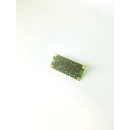 Green rectangular abx penta 60 c+ cbd177bg1-a pcb with gold mounting screws and intricate silver conductive traces