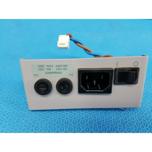 White rectangular power entry panel with black ports and toggle switch for topcon trc-nw8 retinal camera power entry
