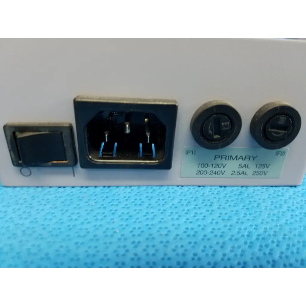 White power entry panel with black ac socket and voltage selector switches for topcon trc-nw8 retinal camera power entry