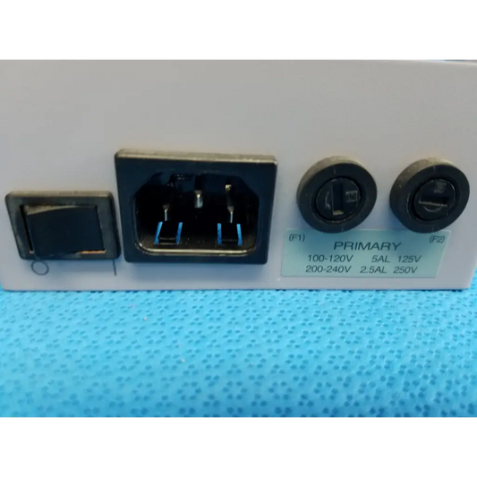 White power entry panel with black ac socket and voltage selector switches for topcon trc-nw8 retinal camera power entry