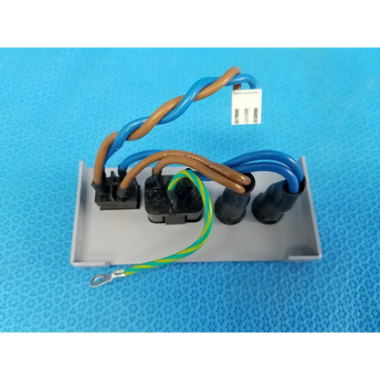 Gray plastic power entry panel with twisted blue brown green-yellow wires black connectors for topcon retinal camera