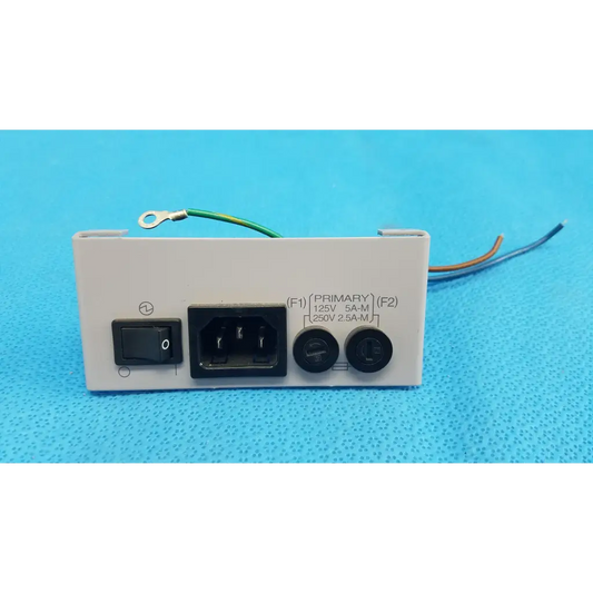 White plastic ac power input plate assembly with fuse holder switch and labeled sockets for topcon trc-nw6s retinal camera