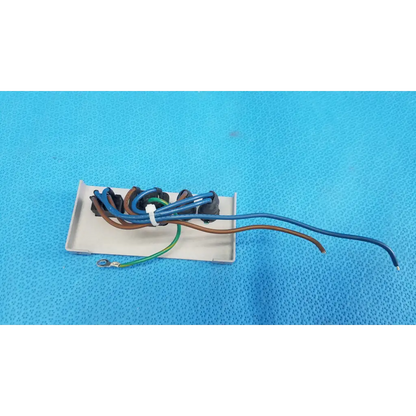 White rectangular power input plate assembly with fuse holder and bundled blue brown green wires secured by zip tie