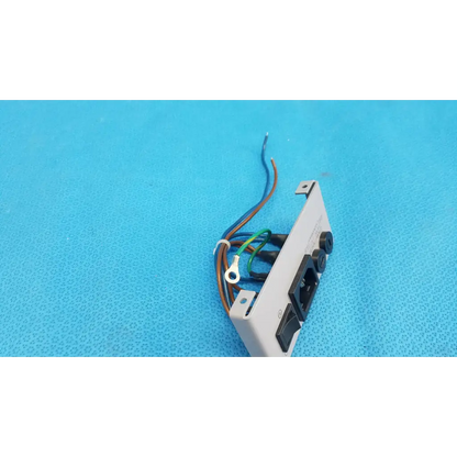 White plastic power input plate assembly with black sockets fuse holder and exposed wires for topcon trc-nw6s retinal camera back side