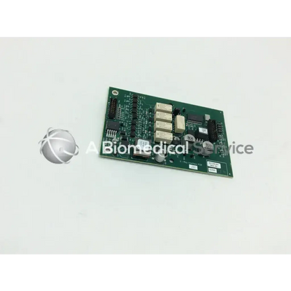 Green rectangular acist medical systems x-ray interface pcb with beige relays and black integrated circuits