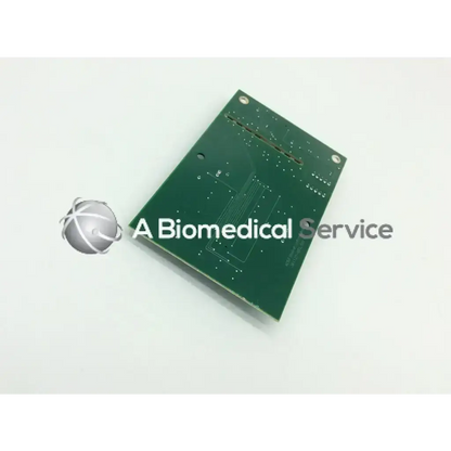 Green rectangular circuit board with silver solder points and mounting holes acist medical systems x-ray interface pcb
