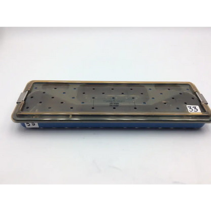 Blue acmi mra-gt telescope case with transparent perforated lid and metallic edges for surgical instrument storage