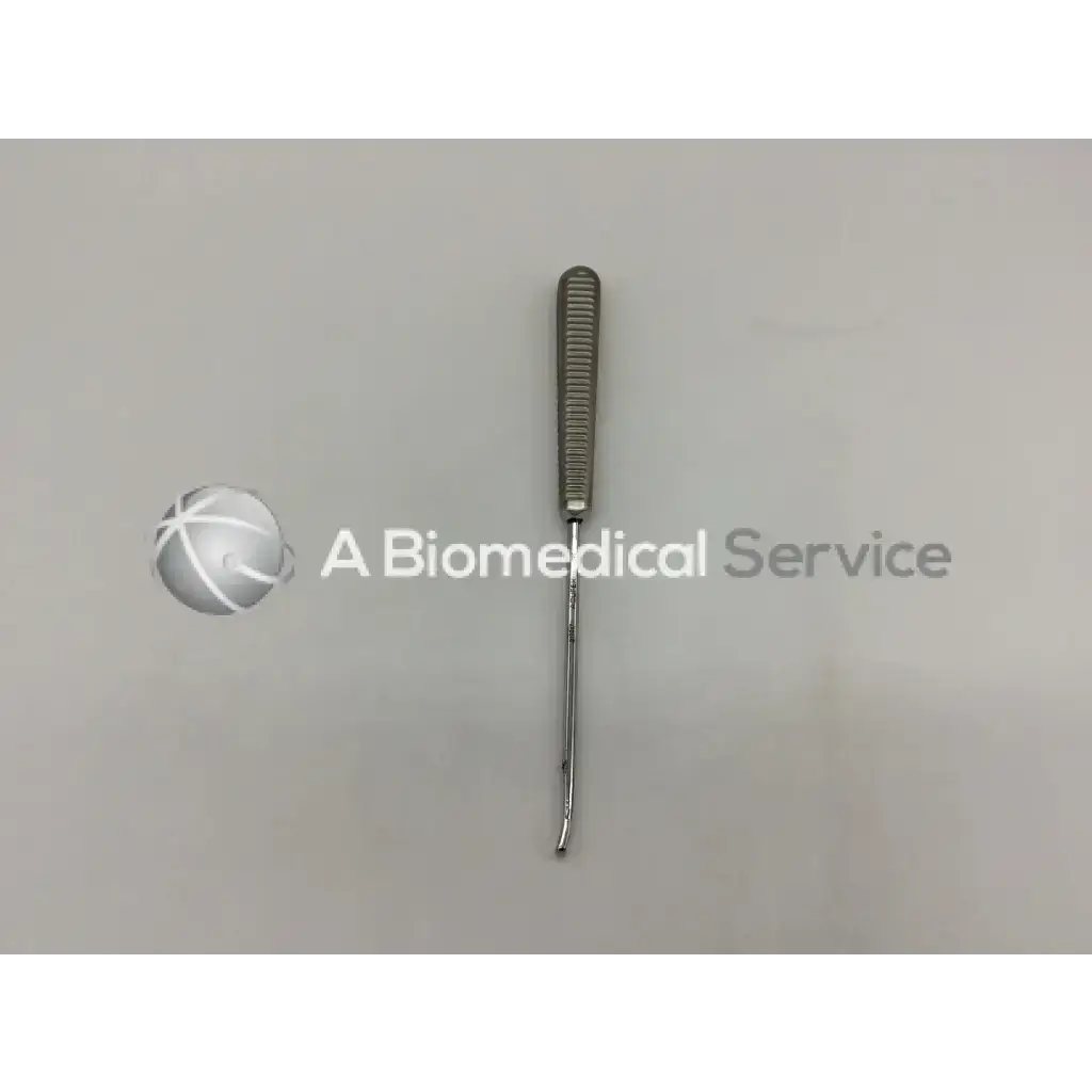 A sleek metallic curette ac5-236 121322sm with textured grip handle and slender curved tip for precision use
