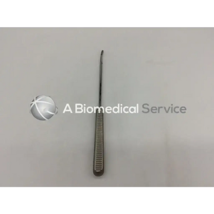Acufex 012717 curette ac5-236 121322sm is a sleek metallic surgical instrument with textured grip and curved tip