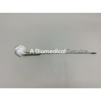 Silver surgical acl chamfering rasp with a spherical head and textured grip for precise chamfering rasp use