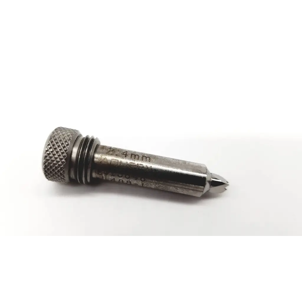 Silver stainless steel surgical drill bit with knurled hexagonal head and tapered pointed tip for precision use