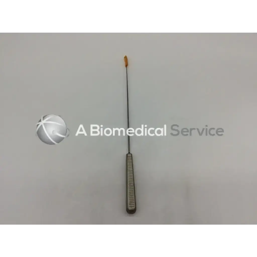 Silver surgical curette with textured handle and orange tip in acufex 015185 endobutton depth probe for precise depth measurement