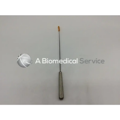 Silver surgical curette with textured handle and orange tip in acufex 015185 endobutton depth probe for precise depth measurement