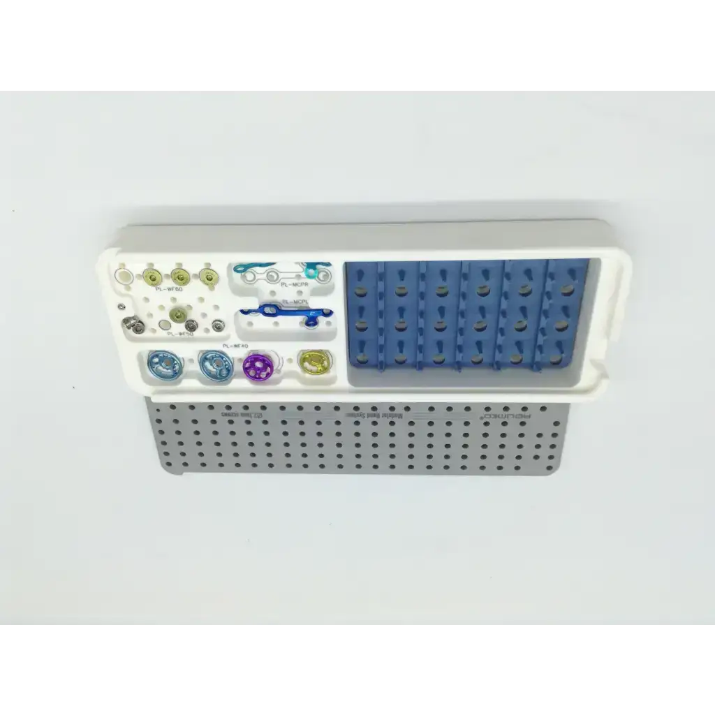 White and blue acumed pl-wf01 modular hand dental implant tray with colored screw heads and perforated metal base