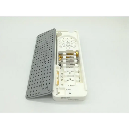 White and gray perforated surgical instrument tray with metallic tools for modular hand acumed pl-wf01 acumed set
