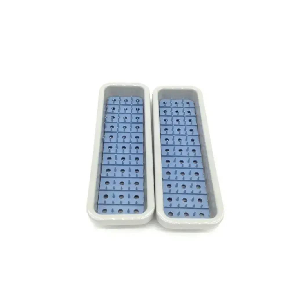 Two light gray plastic trays with blue circular grid holes in acumed pl-wf01 acumed modular hand system set