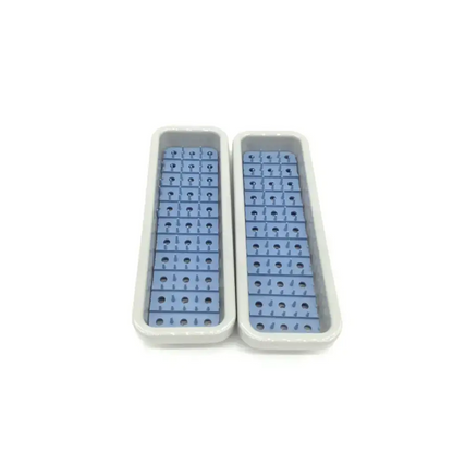 Two light gray plastic trays with blue circular grid holes in acumed pl-wf01 acumed modular hand system set