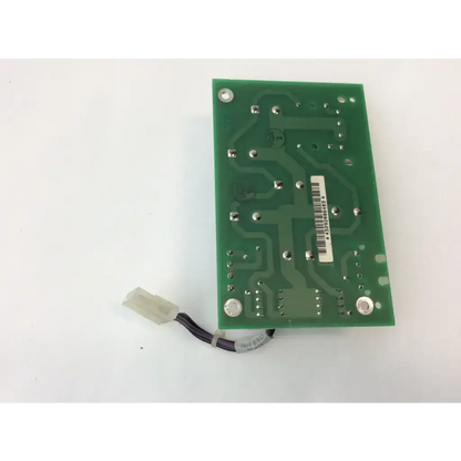 Green rectangular ultrasound circuit board with silver soldered components and black cable attached for rev xa ultrasound