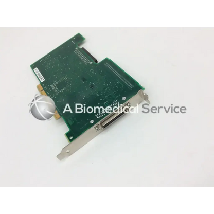 Green adaptec assy 1824706-08 ssci card circuit board with silver metal bracket and connectors featuring a small spherical component
