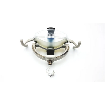 Adec dental surgical silver-toned surgical exam operatory light with clear glass dome and curved metal arms
