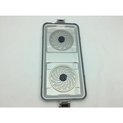 Silver aluminum sterilization case tray container with two perforated circular cooking surfaces and black hubs