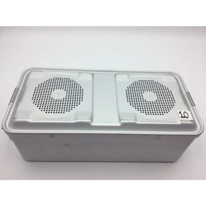 Silver aluminum sterilization case tray container with two circular perforated speaker grilles on the lid