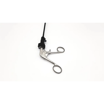 Silver atraumatic laparoscopic prestige grasping forceps with precision handles and sleek metallic finish with black cable