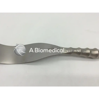 Aesculap BT614R Deaver retractor with a sleek silver curved blade and textured handle for surgical use