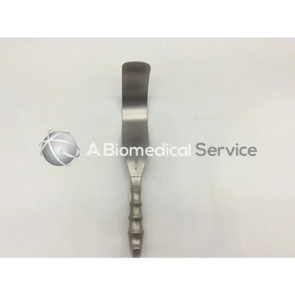 Silver aesculap bt614r deaver retractor with curved flat blade and textured handle for surgical use