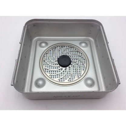 Silver metal air fryer basket with circular perforated insert and black knob in aesculap jn340 instrument sterilisation tray