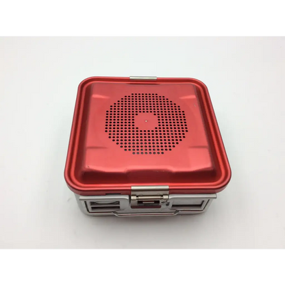 Red metallic aesculap jn341 half-size perforated retention plate sterilization container with silver latch and jk385 lid