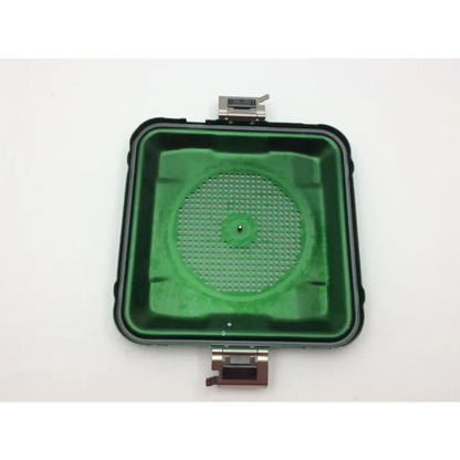 Green plastic perforated retention plate with black rubber edges and metallic latches for aesculap jn341 sterilization container