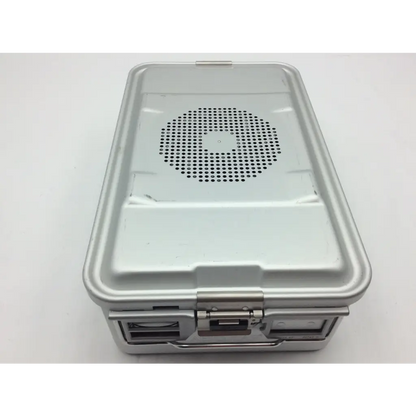 Silver metallic aesculap jn742 sterilization case with circular perforated lid and reinforced latches for surgical use