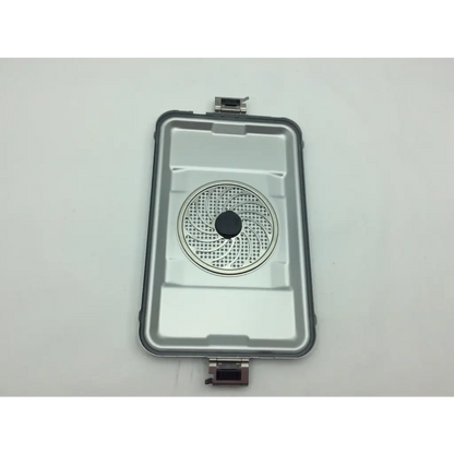 Silver rectangular metal aesculap jn742 sterilization case surgical with circular perforated grille and black center