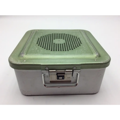 Vintage-style metal sterile container with green lid and sturdy latch in jf113r case by aesculap sterile container system